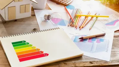 Concept of ecological and bio energetic house.efficiency rating on notebooks.