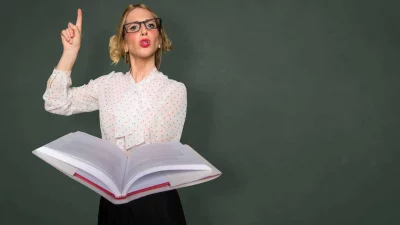 Smart nerd teacher substitute lecturing class with text book in classroom space for print